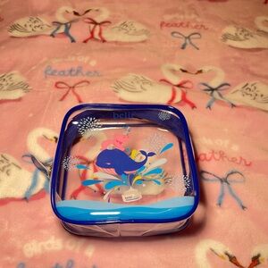 Blue and Clear Belif Container